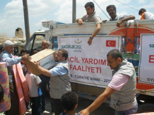 Sadakataşı Derneği'nden Suriyeli mültecilere yardım - Resim 2