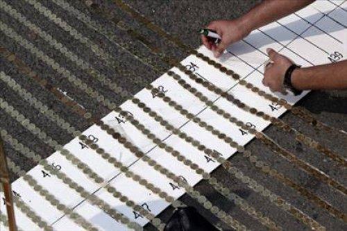 Madeni para ile en uzun hat rekoru