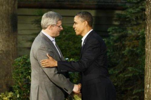 G8 Zirvesi'nde espiriler havada uçuştu