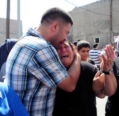 Almanya'da öldürülen 3 kardeş toprağa verildi