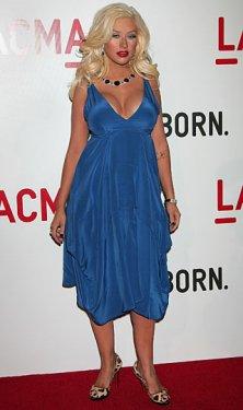 Clinton gözlerini Aguilera'nın göğüslerinden alamadı