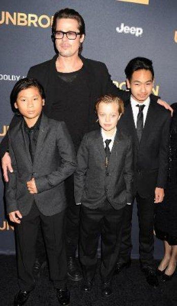 Angelina Jolie'nin kızı Shiloh ağabeylerine özendi 