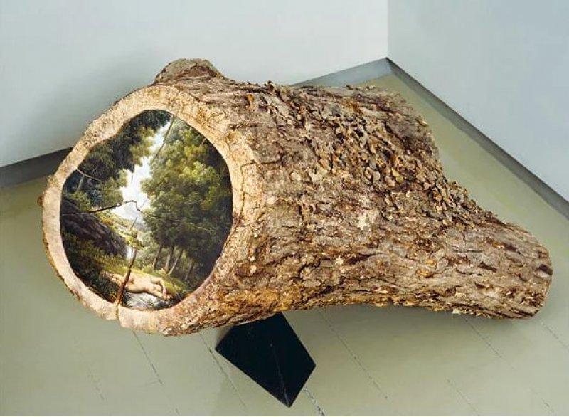 Ağaç kütükleri üzerine çizilmiş gerçek manzaralar