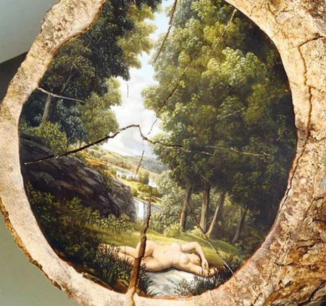 Ağaç kütükleri üzerine çizilmiş gerçek manzaralar