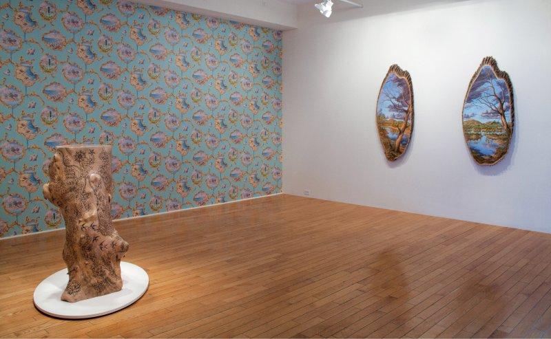 Ağaç kütükleri üzerine çizilmiş gerçek manzaralar