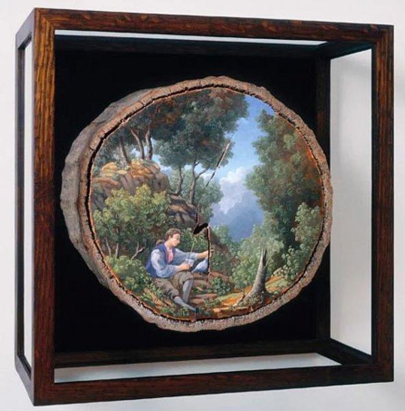 Ağaç kütükleri üzerine çizilmiş gerçek manzaralar