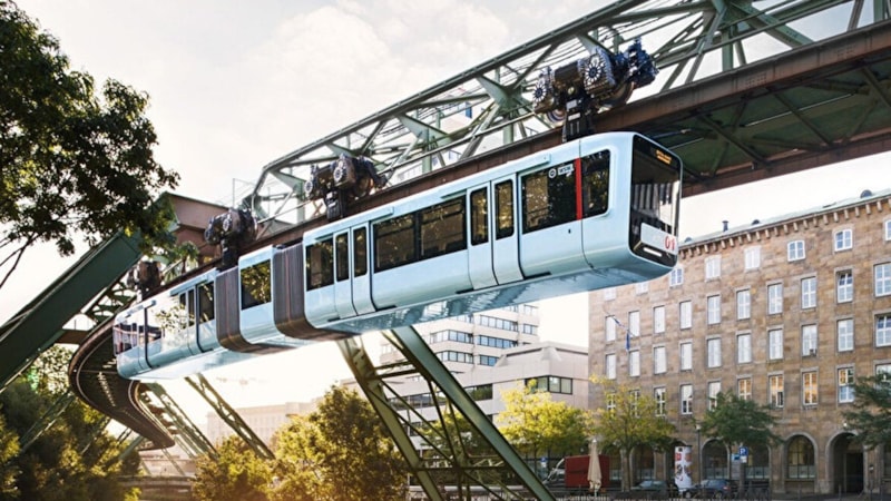 Böylesini görmediniz: Trenler asılı gidiyor! İşte, görenin şaşıp kaldığı ilginç ulaşım araçları…