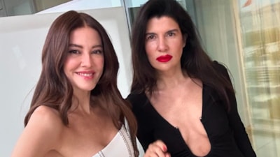 Kıvanç Tatlıtuğ'un eşi Başak Dizer beyaz elbisesiyle büyüledi