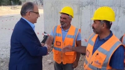 Bakan Mehmet Özhaseki ve işçiler arasında gülümseten diyalog