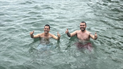 Muğla'da kuvvetli sağanak sırasında denize girdiler