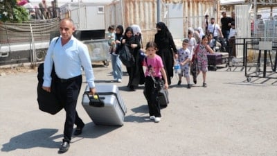 Türkiye'deki Suriyelilerin ülkelerine dönüşü bayram sonrasında da sürüyor