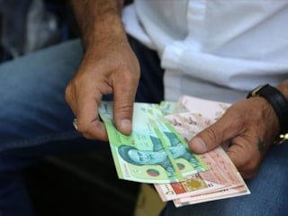 Riyal dolar karşısında eridi! İran merkez bankası başkanı değişti