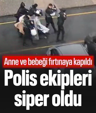 İstanbul'da fırtınaya takılan anne ve bebeğine polis siper oldu