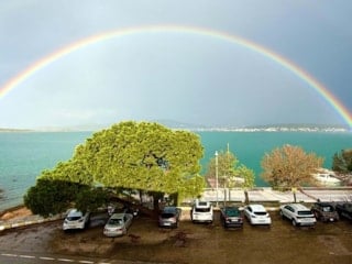 Fırtınanın ardından Ayvalık’ta gökkuşağı sürprizi
