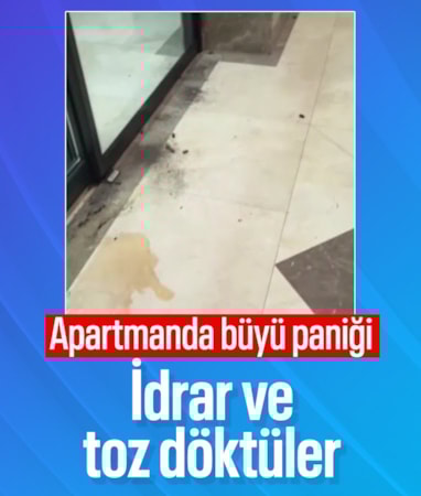 Kayseri'de kimliği belirsiz kişiler bir apartmanın girişine idrar ve toz döktü