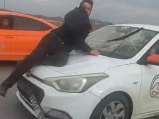 Ankara'da trafikte tartıştığı sürücüyü kaputta kilometrelerce sürükledi