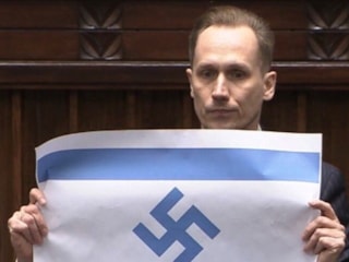 Polonya Parlamentosu’nda milletvekili, Nazi sembollü İsrail bayrağı açtı