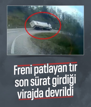 Bursa'da freni boşalan tır virajı alamayınca devrildi
