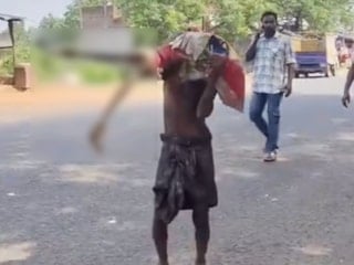 Hindistan'da mezardan kardeşini çıkarıp para çekmeye gitti