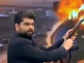 İran televizyonu, olası ABD saldırısına karşı halka silah eğitimi veriyor