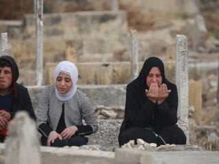 Gazze'de Kurban Bayramı namazı sonrası kabir ziyaretleri