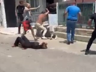Kocaeli'de eşini sokak ortasında bıçaklayan şüpheliye linç girişimi