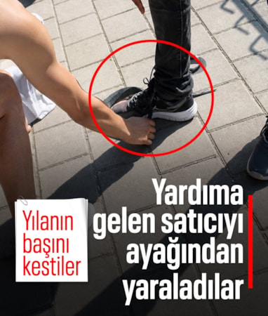 Adana'da nehirden çıkardıkları yılanın başını ezip çakıyla keserek öldürdüler