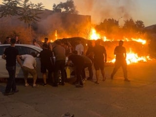 Bursa'da çöp yangını paniği: Alevler çalılığa sıçradı, otomobil son anda kurtarıldı