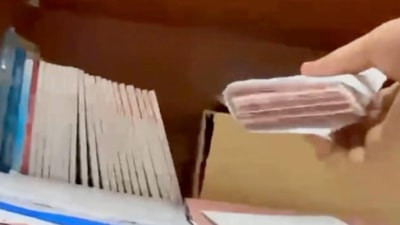 İzmit Belediyesi yolsuzluk soruşturmasında yeni görüntüler: Figan Çetin'e para dolu zarf