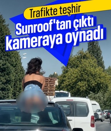 Manisa'da 'sunroof'tan çıkan kadın, ilginç hareketleriyle dikkat çekti