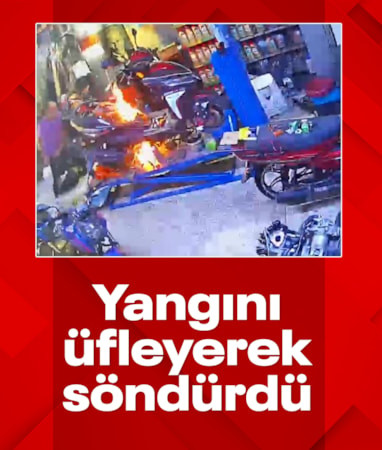 Manisa'da motosiklet tamirhanesinde şaşırtan anlar: Alevleri üfleyerek söndürdü