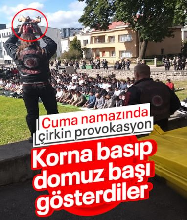 Litvanya'da cuma namazına çirkin saldırı: Korna basıp, domuz başı gösterdiler