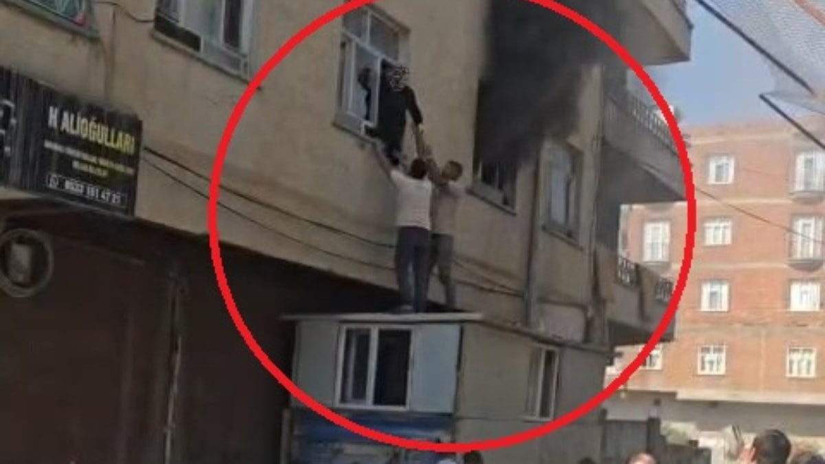 Diyarbakır'da yangında mahsur kaldı: Mahalleli konteynerin üzerine çıkarak kurtardı