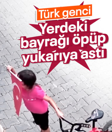 Giresun'da minik kız, yere düşen Türk bayrağını öperek yüksek bir noktaya astı