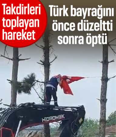 Düzce'de önce makinenin üzerine çıkıp Türk bayrağını düzeltti