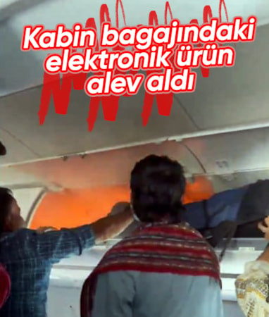 Hindistan'da kabin bagajında taşınan elektronik cihaz alev aldı