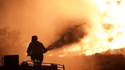 İzmir'in Buca ilçesindeki orman yangınına müdahale ediliyor