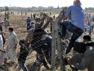 BM'den Türkiye'ye: Kobani'ye geçişlere izin verin