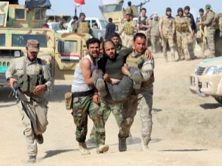 Tikrit'te yaralanan Iraklı asker