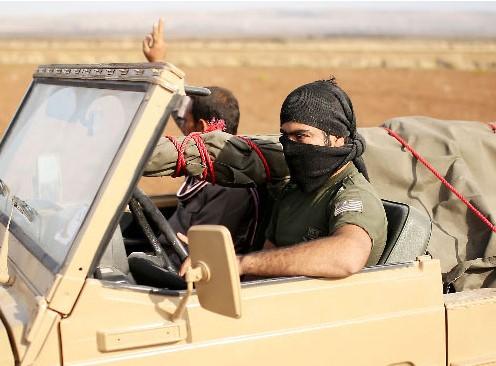 ABD üniformalı peşmergeler Kobani'ye gidiyor