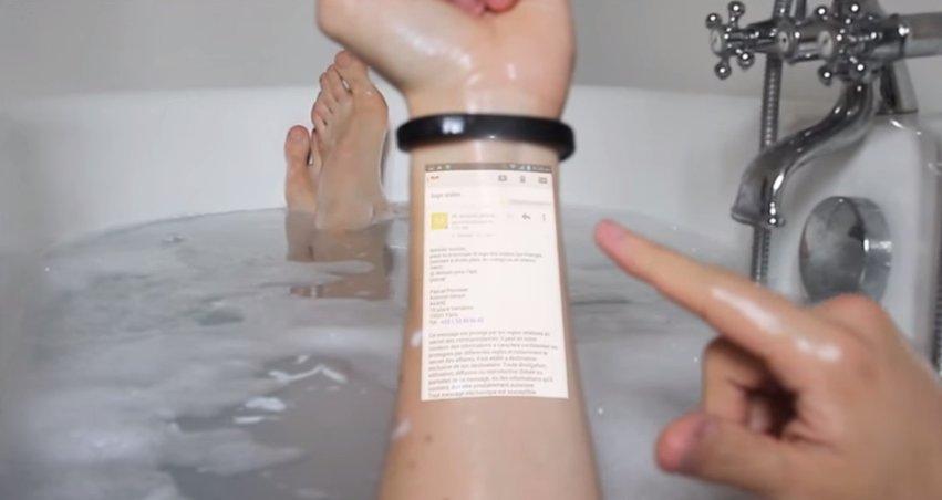 Akıllı bileklik Cicret telefon ekranını kola yansıtıyor