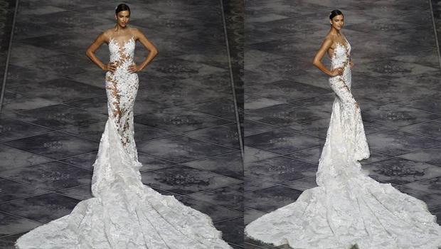 Irina Shayk şeffaf gelinlikle podyumda