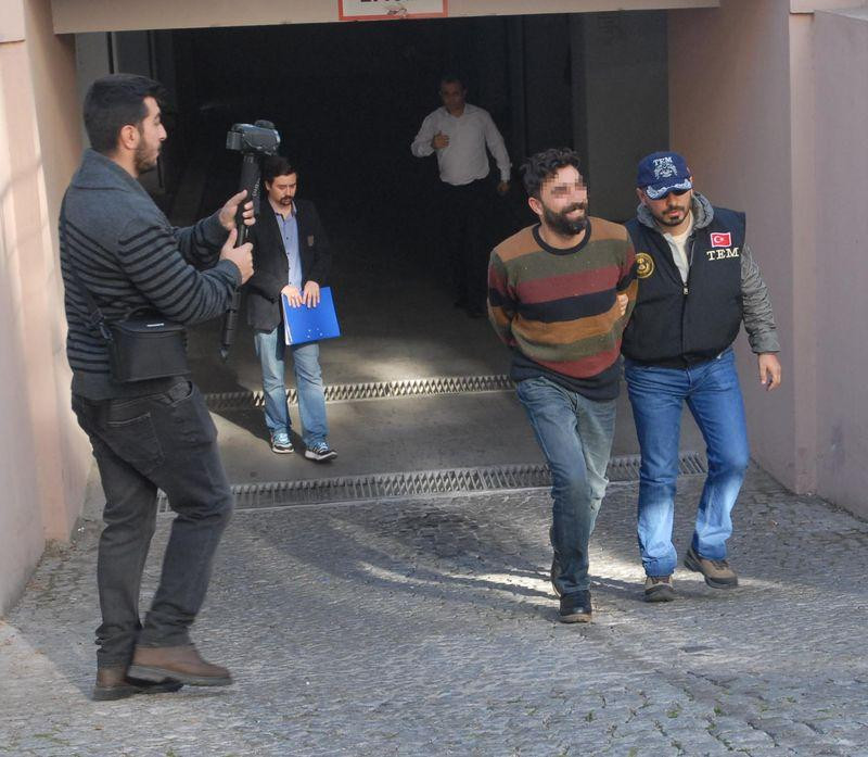 Yakalanan PKK'lı adliyeye giderken güldü