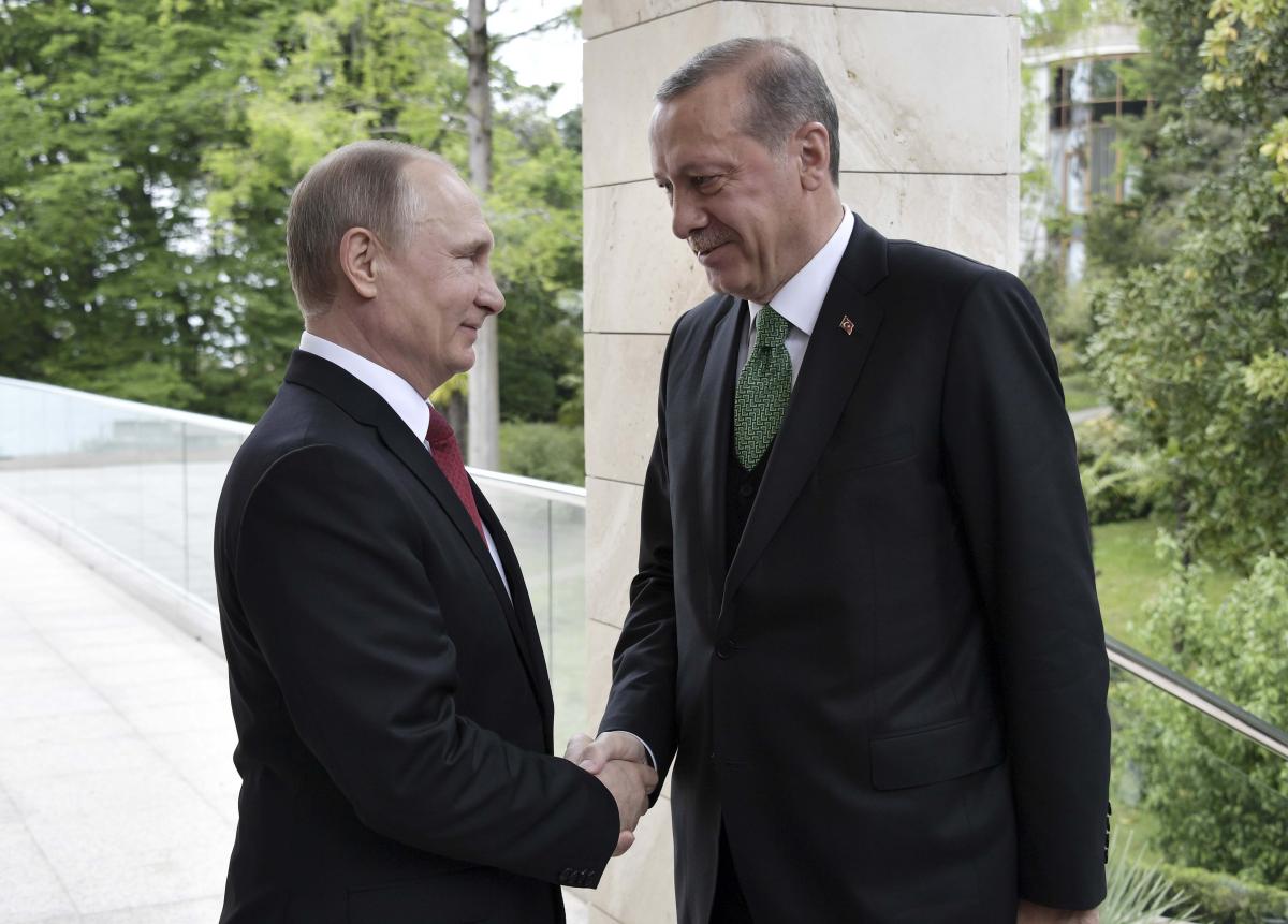 Erdoğan Rus askerlerinin fotoğraflarını Putin'e gösterdi