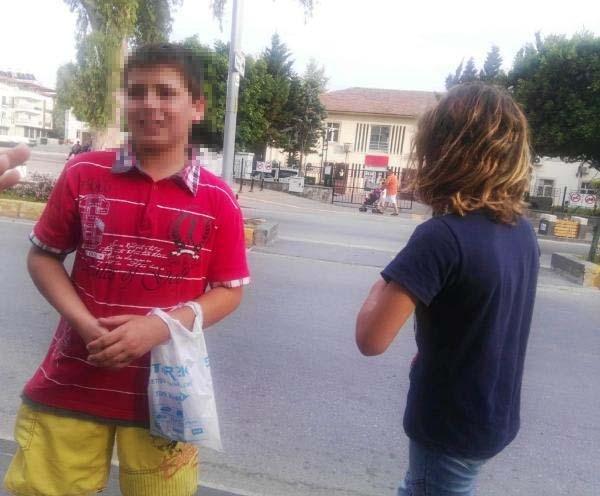 Dilenci kadın Suriyeli kardeşleri dövdü