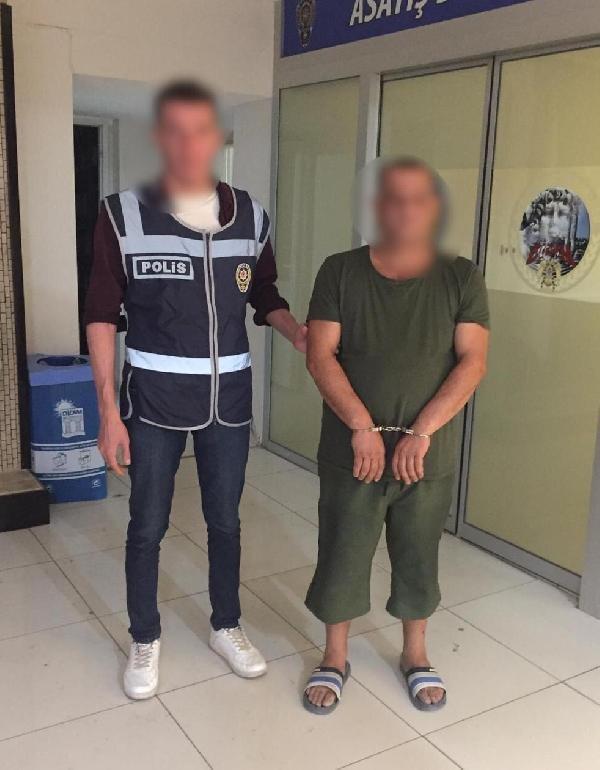 Ayrıldığı eşinin evine silahla girerken yakalandı