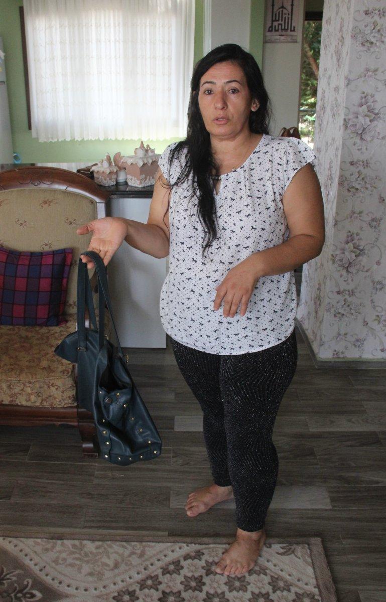 Eşine çanta fırlatan kadın 3 bin TL ceza ödedi