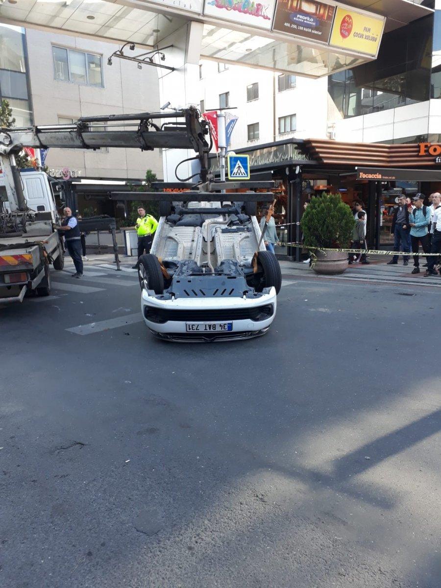 Takla atan otomobilden zor kurtuldu