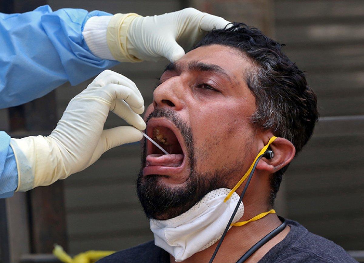 Dünyadan koronavirüs testi manzaraları