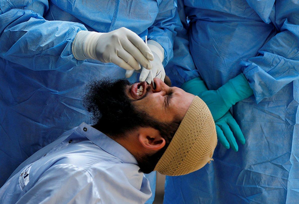 Dünyadan koronavirüs testi manzaraları